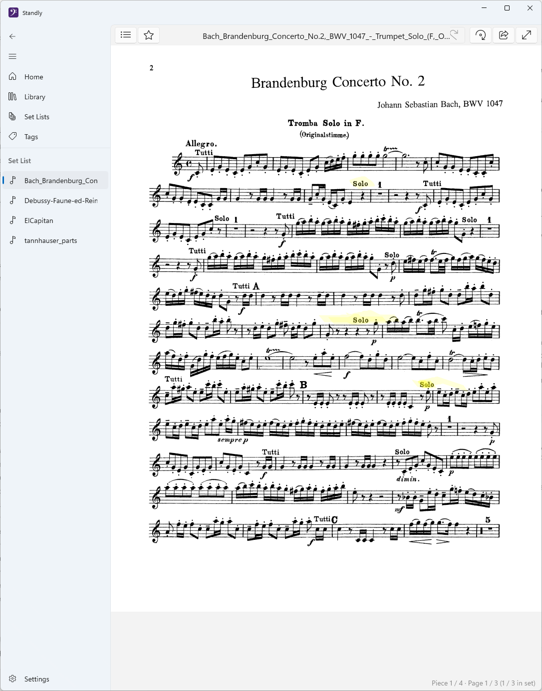 Sheet music marked up with yellow highlighter annotations